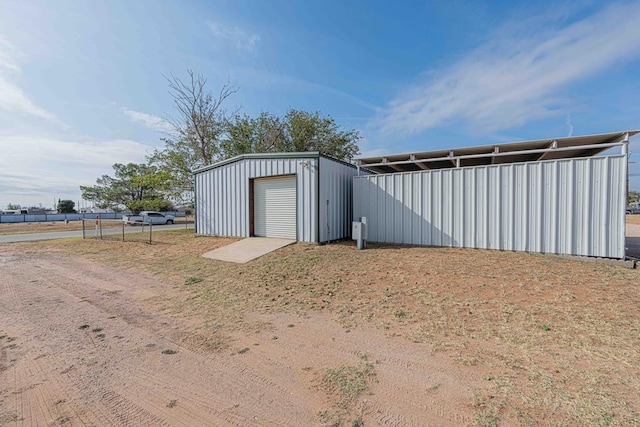 50031 E County Rd 71, Midland, TX 79705 - view of outdoor structure featuring driveway