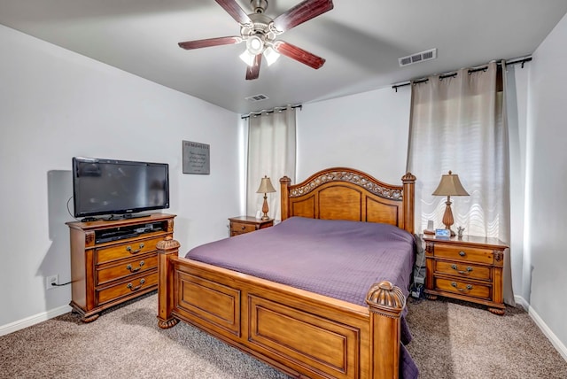bedroom featuring ceiling fan, light colored carpet, baseboards, and visible vents