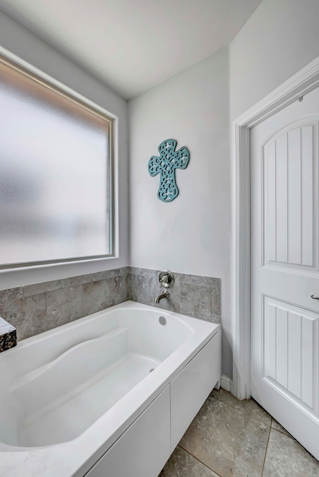 full bath featuring a bath
