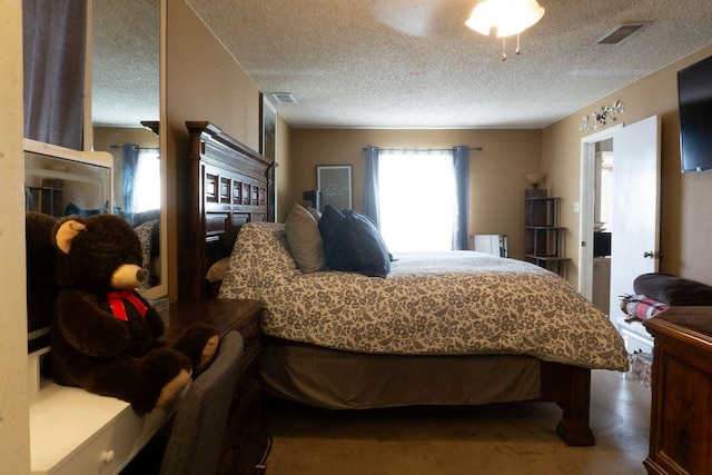 5110 Sunnyside Dr, Midland, TX 79703 - bedroom with a textured ceiling