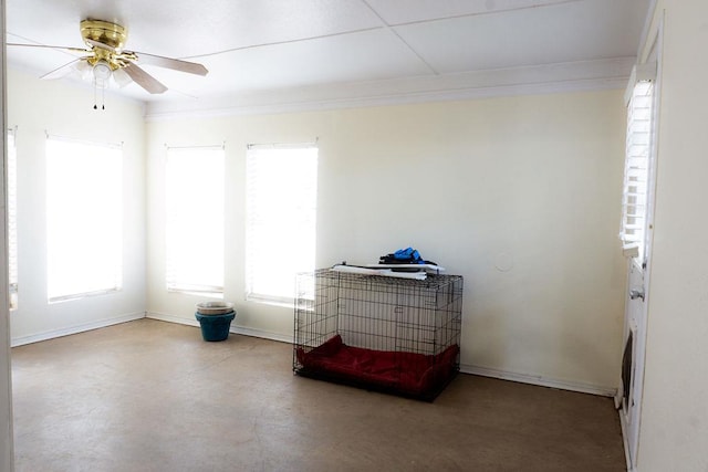 5110 Sunnyside Dr, Midland, TX 79703 - bedroom featuring baseboards, crown molding, ceiling fan, and concrete floors