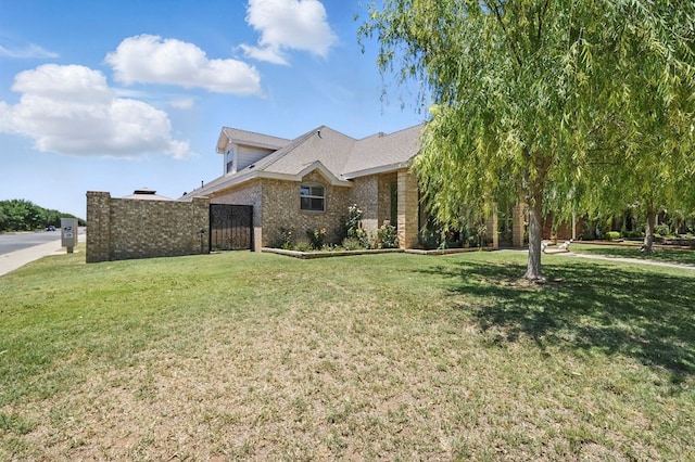 5001 Crista Ln, Midland, TX 79707 - view of side of home with brick siding