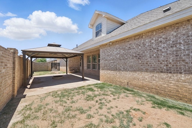 5001 Crista Ln, Midland, TX 79707 - fenced backyard featuring a gazebo and a patio area
