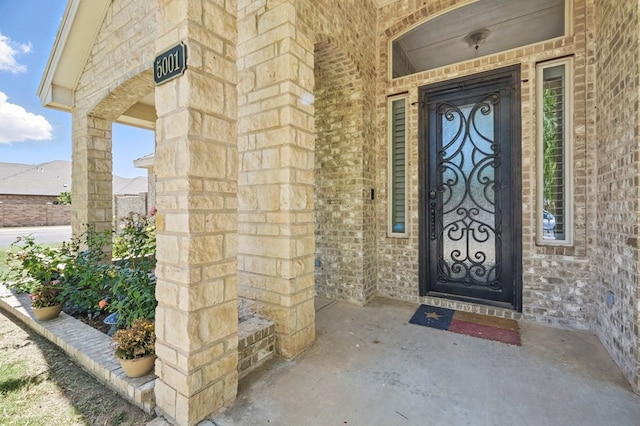 5001 Crista Ln, Midland, TX 79707 - doorway to property featuring stone siding