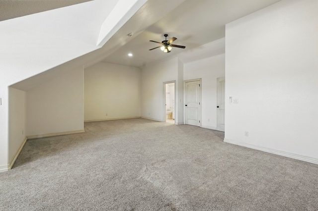 5001 Crista Ln, Midland, TX 79707 - bonus room featuring lofted ceiling, light colored carpet, ceiling fan, and baseboards
