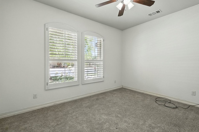 5001 Crista Ln, Midland, TX 79707 - unfurnished room featuring a ceiling fan, carpet flooring, and baseboards