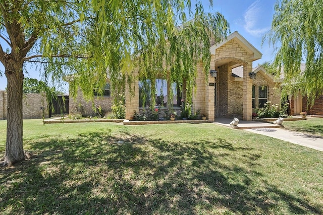 5001 Crista Ln, Midland, TX 79707 - view of front of home featuring brick siding