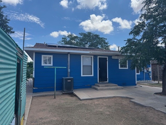 1510 S Fort Worth, Midland, TX 79701 - back of property with solar panels and a patio