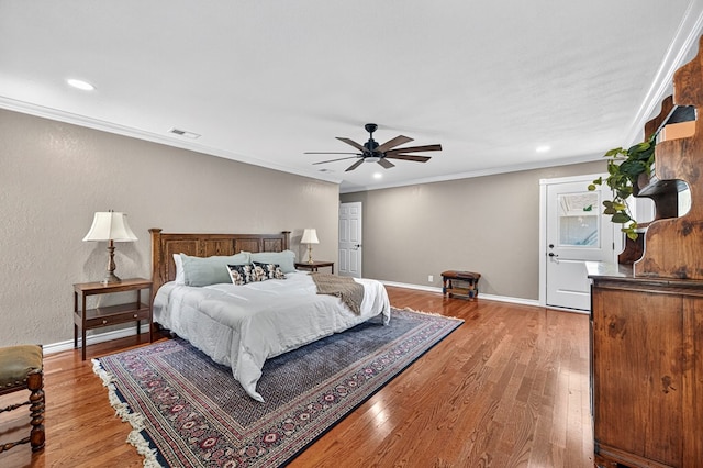 2409 Stutz Pl, Midland, TX 79705 - bedroom with light wood-type flooring, ornamental molding, recessed lighting, and ceiling fan