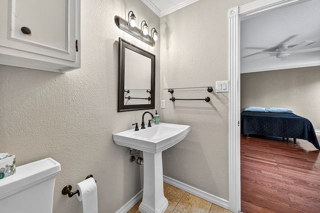 2409 Stutz Pl, Midland, TX 79705 - bathroom with ornamental molding, a ceiling fan, and ensuite bathroom