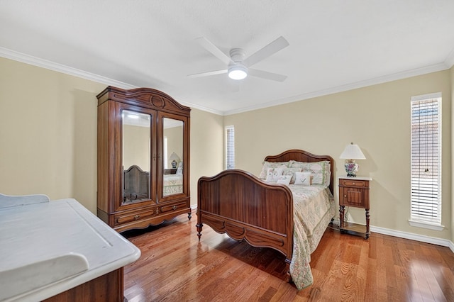 2409 Stutz Pl, Midland, TX 79705 - bedroom featuring wood finished floors, crown molding, and ceiling fan