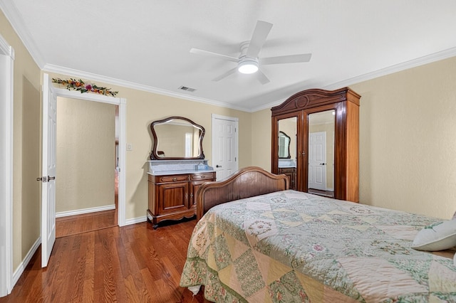 2409 Stutz Pl, Midland, TX 79705 - bedroom with dark wood-type flooring, ornamental molding, and ceiling fan