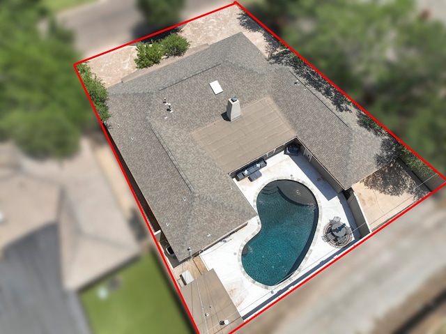 2409 Stutz Pl, Midland, TX 79705 - aerial view of property and surrounding area with property parcel outlined and a pool