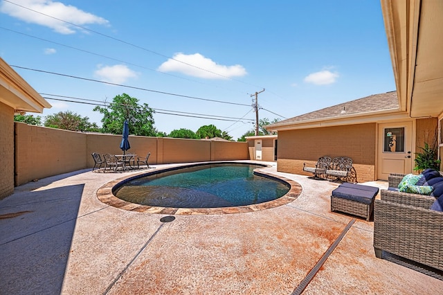2409 Stutz Pl, Midland, TX 79705 - view of swimming pool featuring a patio and a fenced backyard