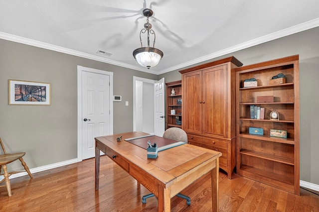 2409 Stutz Pl, Midland, TX 79705 - office area with light wood-type flooring and crown molding