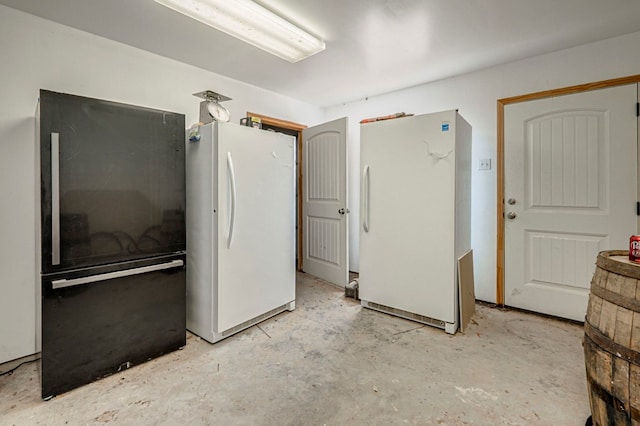 interior space featuring concrete flooring