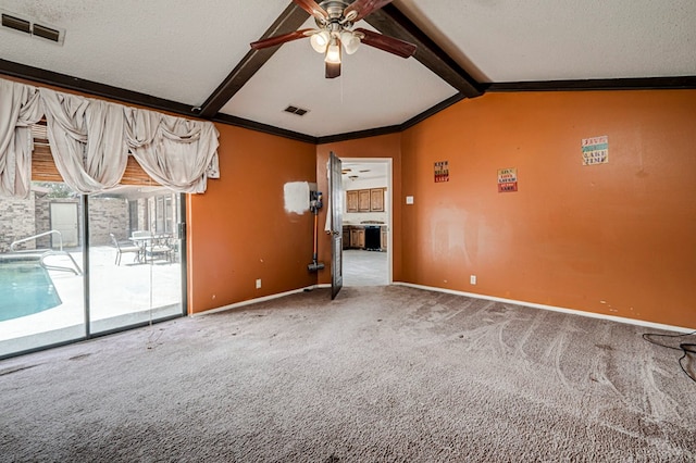 carpeted spare room with lofted ceiling with beams, visible vents, ceiling fan, and baseboards