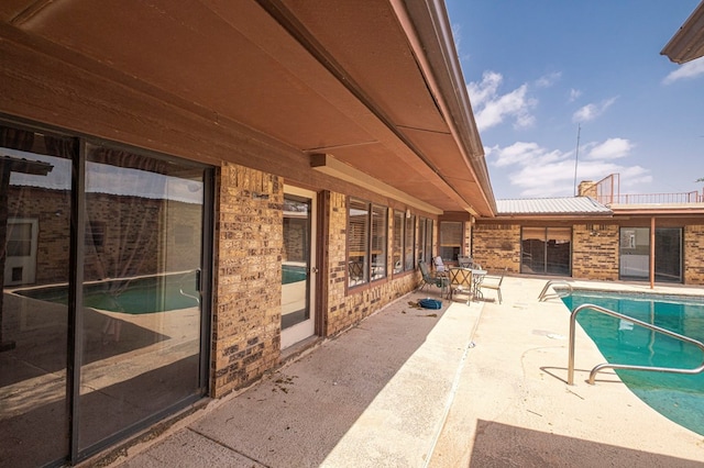 pool featuring a patio