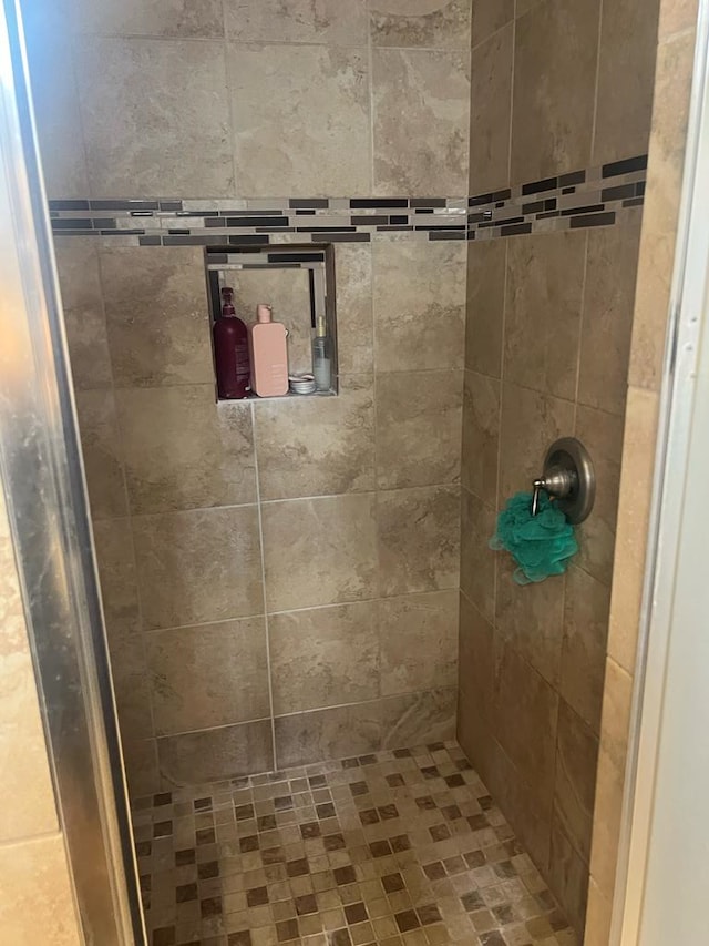 full bath featuring a stall shower