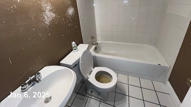 full bathroom featuring tile patterned floors, sink, shower / tub combination, and toilet