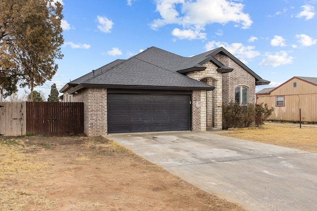 view of front of property with a garage