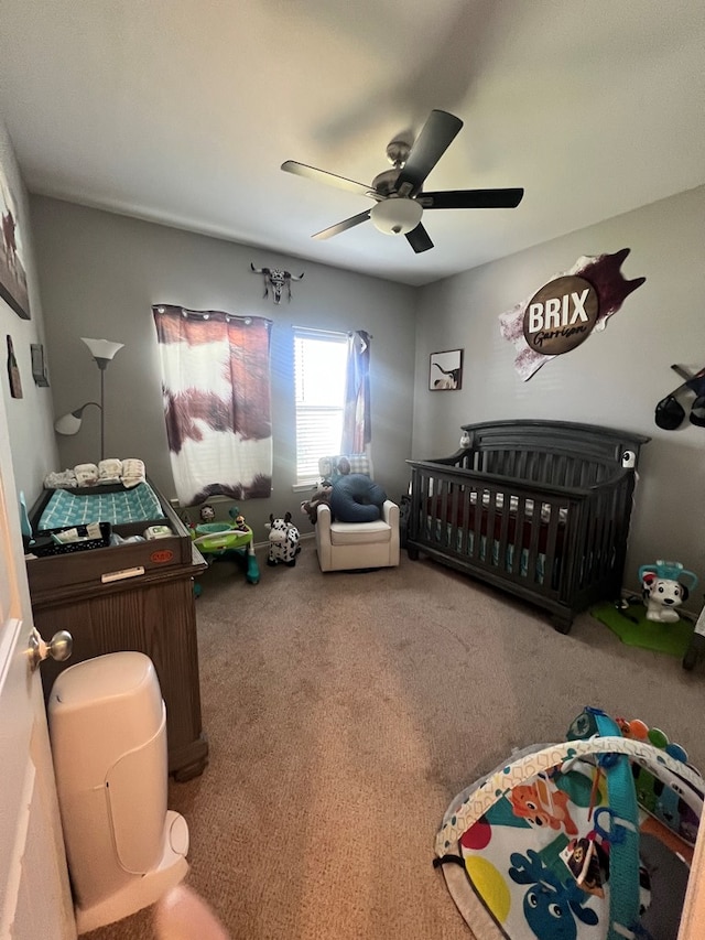 carpeted bedroom featuring ceiling fan