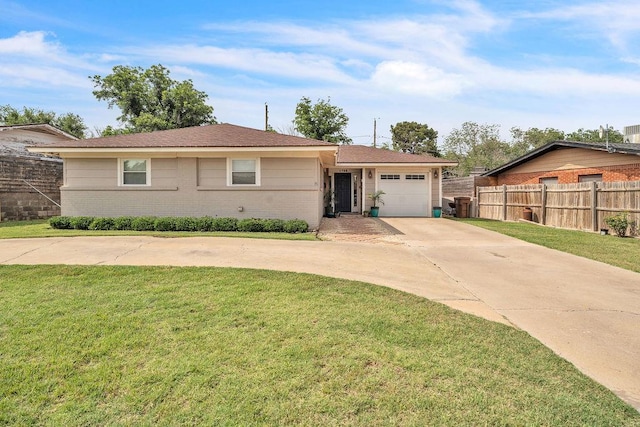 1722 Purdue Ave, Big Spring, TX 79720 - ranch-style home with driveway, an attached garage, and brick siding