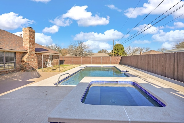 view of swimming pool with a fenced in pool, an in ground hot tub, a fenced backyard, and a patio