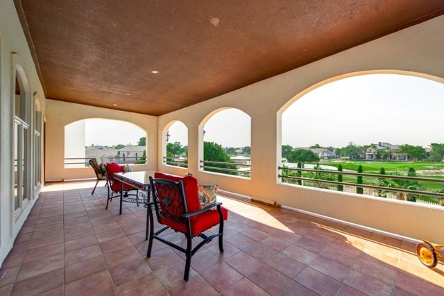 view of patio / terrace with a balcony