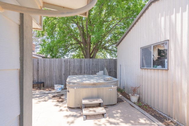 1509 Cascade Ct, Midland, TX 79703 - fenced backyard featuring a hot tub and a patio
