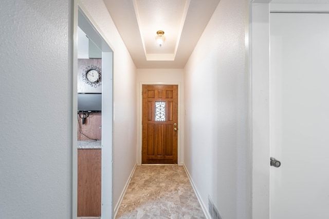 1509 Cascade Ct, Midland, TX 79703 - doorway to outside featuring baseboards