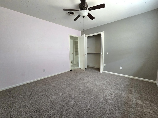 unfurnished bedroom featuring ceiling fan and carpet floors