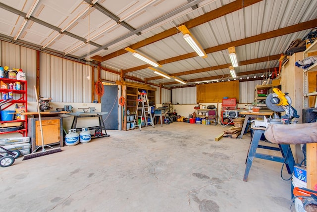 10903 E County Rd 105, Midland, TX 79706 - garage featuring a workshop area