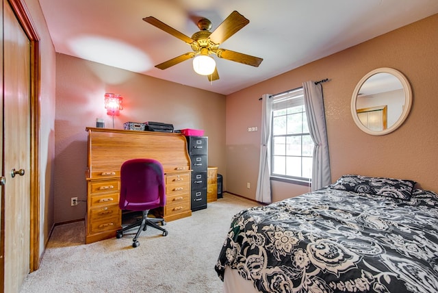 10903 E County Rd 105, Midland, TX 79706 - bedroom with carpet, an office area, and ceiling fan