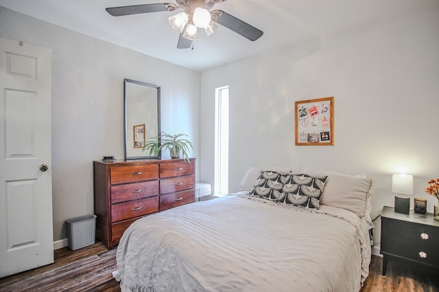 3405 44th St, Snyder, TX 79549 - bedroom with a ceiling fan and dark wood finished floors