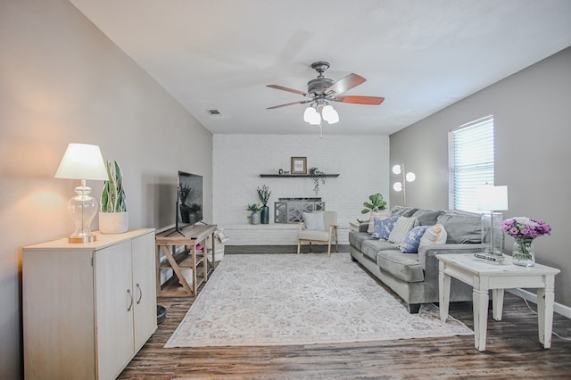 3405 44th St, Snyder, TX 79549 - living area featuring dark wood-type flooring, ceiling fan, and visible vents