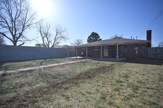 3405 44th St, Snyder, TX 79549 - view of yard with a fenced backyard and a patio area
