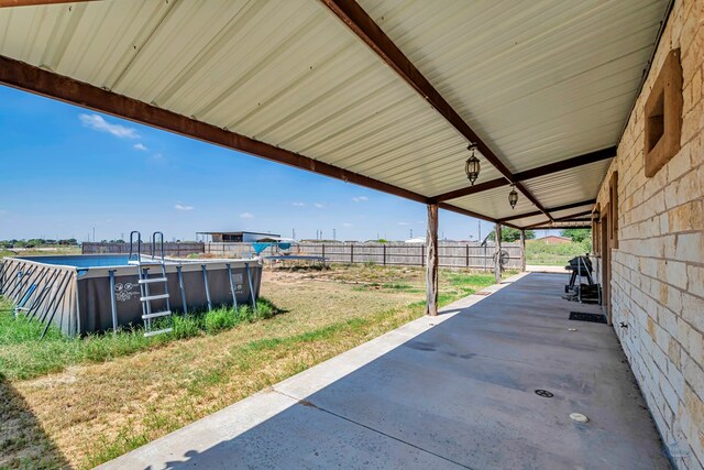 10500 E County Rd 90, Midland, TX 79706 - view of patio with an outdoor pool