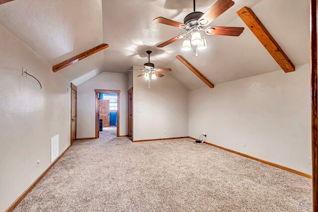 10500 E County Rd 90, Midland, TX 79706 - bonus room with ceiling fan, light colored carpet, vaulted ceiling, and baseboards