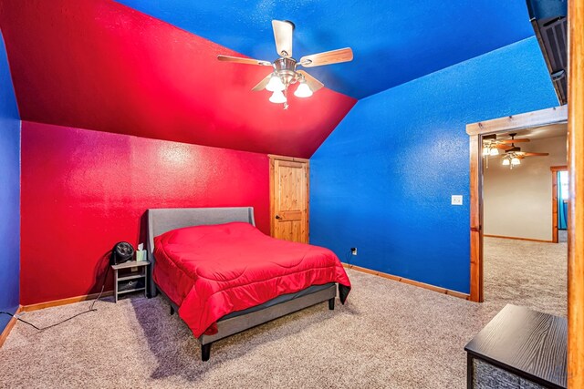 10500 E County Rd 90, Midland, TX 79706 - bedroom featuring lofted ceiling, carpet flooring, a ceiling fan, and baseboards