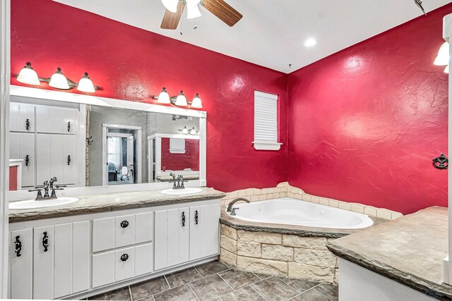 10500 E County Rd 90, Midland, TX 79706 - full bathroom featuring a bath, double vanity, and ceiling fan