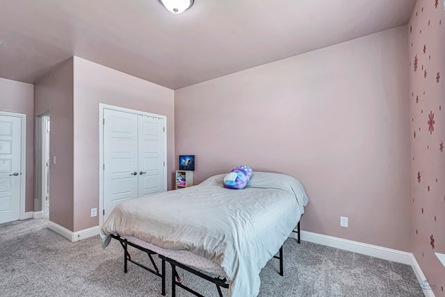 6003 Sunny Stone Dr, Midland, TX 79705 - carpeted bedroom with baseboards and a closet