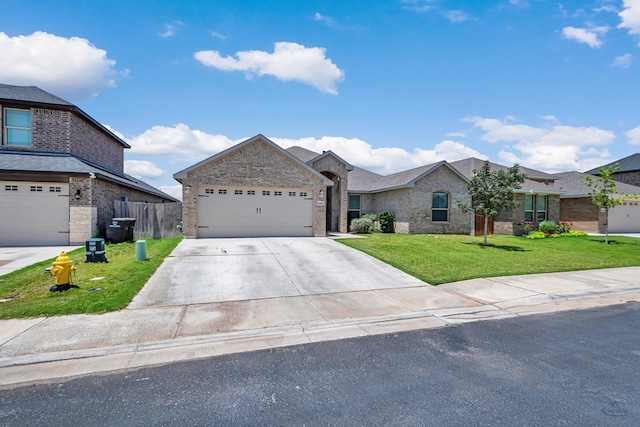 6003 Sunny Stone Dr, Midland, TX 79705 - ranch-style home with driveway, brick siding, and a garage