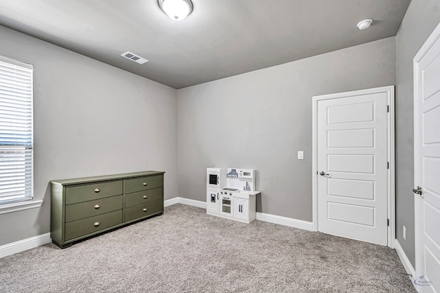 6003 Sunny Stone Dr, Midland, TX 79705 - carpeted bedroom with baseboards