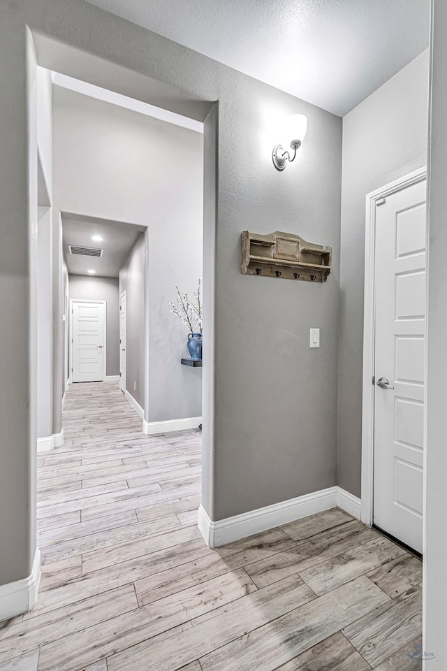 6003 Sunny Stone Dr, Midland, TX 79705 - hall featuring light wood-style flooring