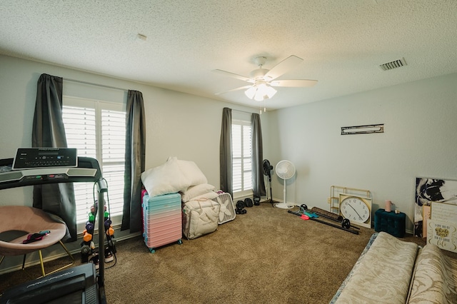5000 Thames Ct, Midland, TX 79705 - rec room with ceiling fan, a textured ceiling, carpet, and baseboards