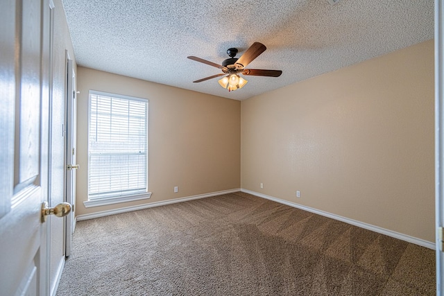 4513 Rosewood Dr, Midland, TX 79707 - empty room with baseboards, carpet flooring, a textured ceiling, and a ceiling fan