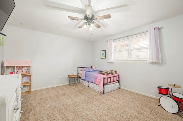 bedroom featuring ceiling fan and light colored carpet