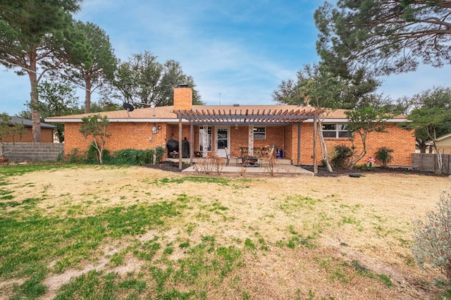 rear view of house with a patio area