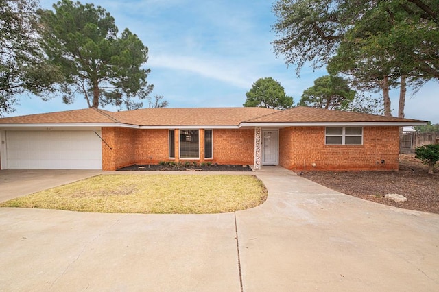 ranch-style home with a garage